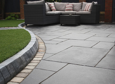 Charcoal Classicstone pavers beautifully transform an outdoor area with their sophisticated design and robust durability.